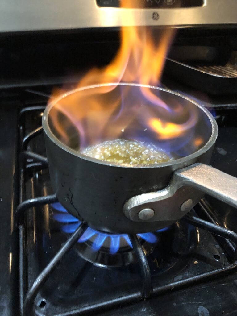 fire in cooking pot